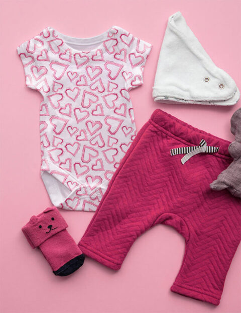 pattern san valentino hearts pink background eva lo coco bodysuite